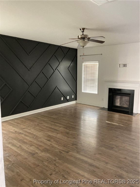 270 Stonebriar Avenue Raeford, NC 28376 - Photo 5 of 26 a view of a livingroom with wooden floor and a fireplace