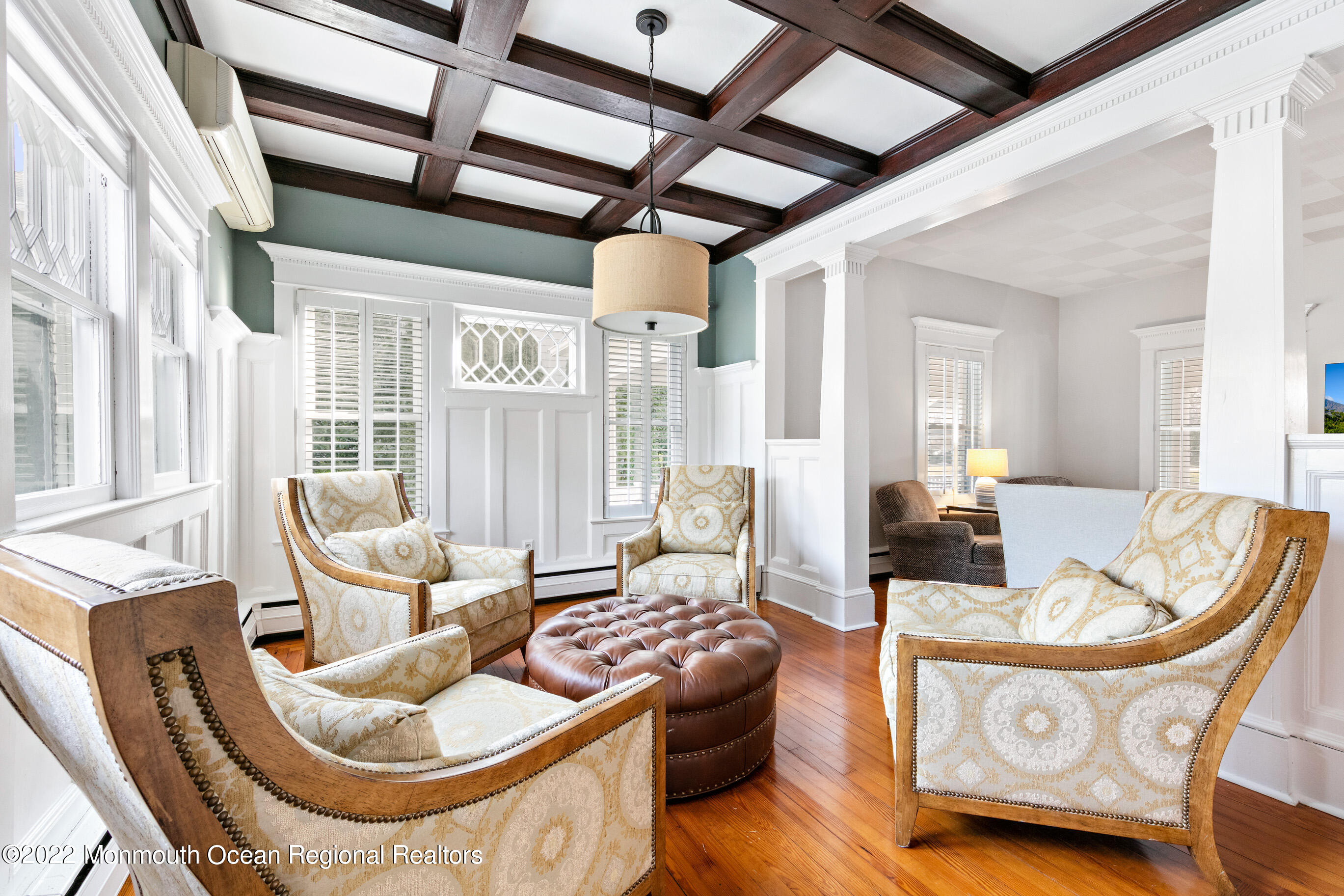 116 Tuttle Avenue Spring Lake, NJ 07762 - Photo 12 of 45 a living room with furniture and a chandelier