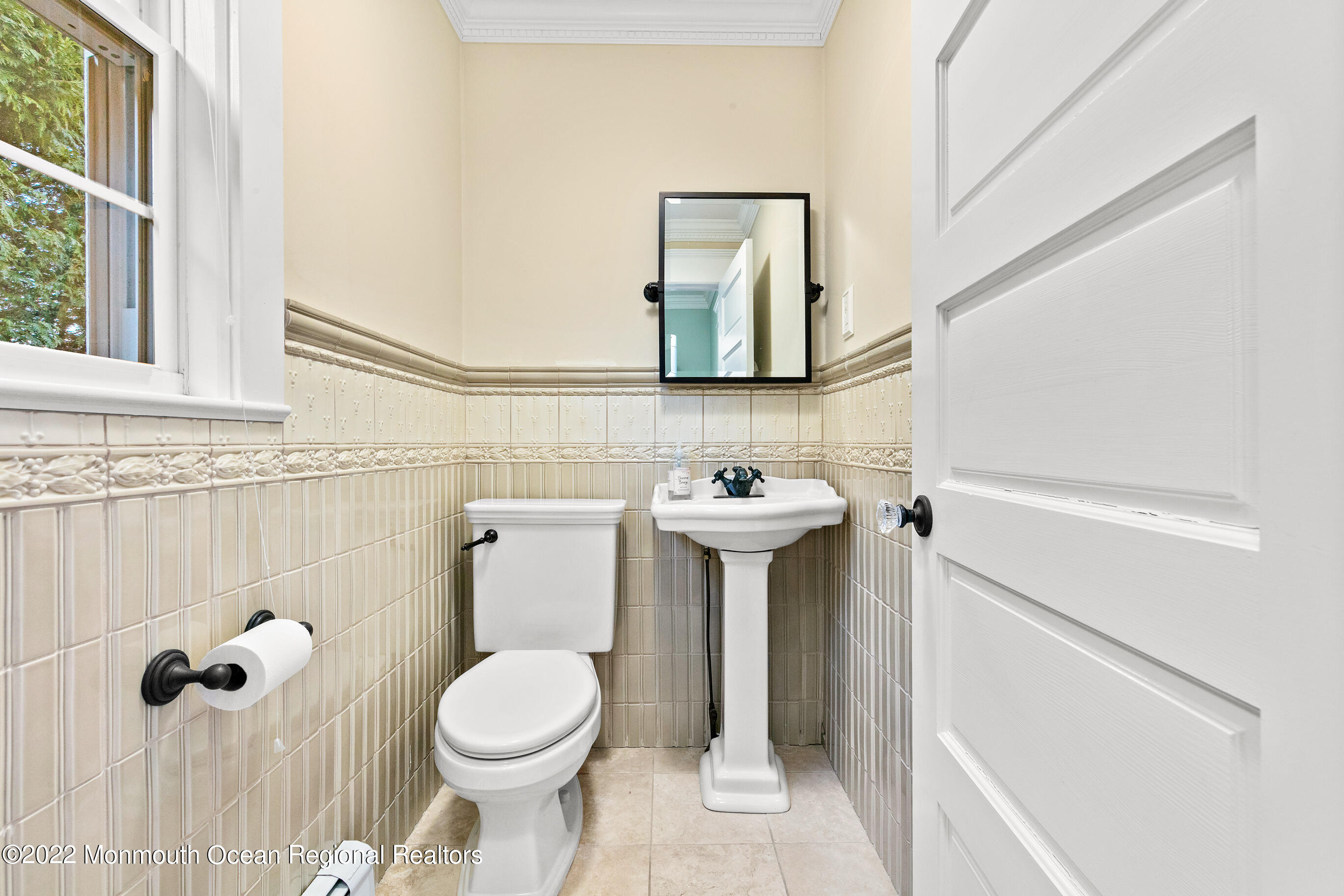 116 Tuttle Avenue Spring Lake, NJ 07762 - Photo 21 of 45 a bathroom with a sink toilet and mirror