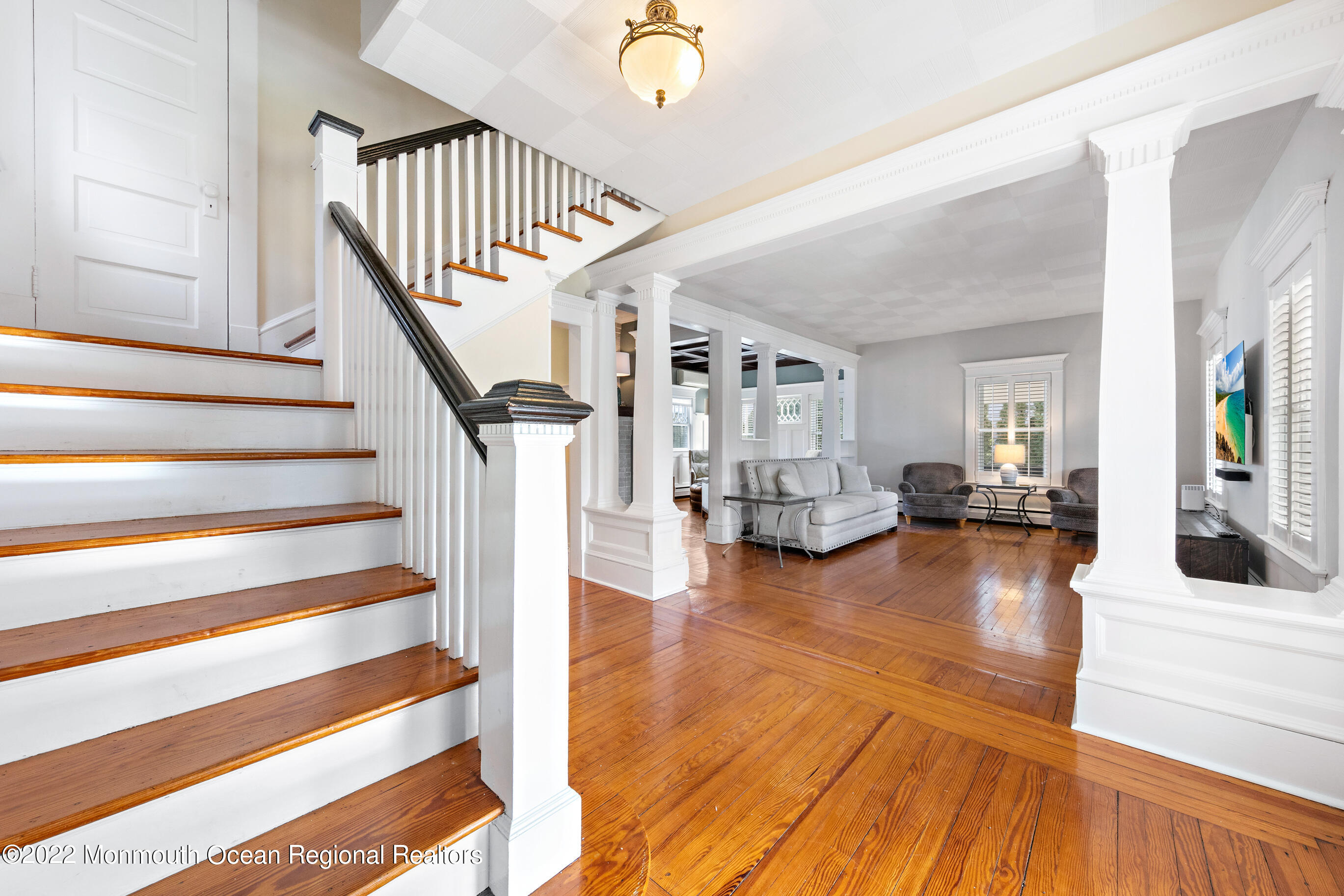 116 Tuttle Avenue Spring Lake, NJ 07762 - Photo 22 of 45 a view of entryway and hall with wooden floor