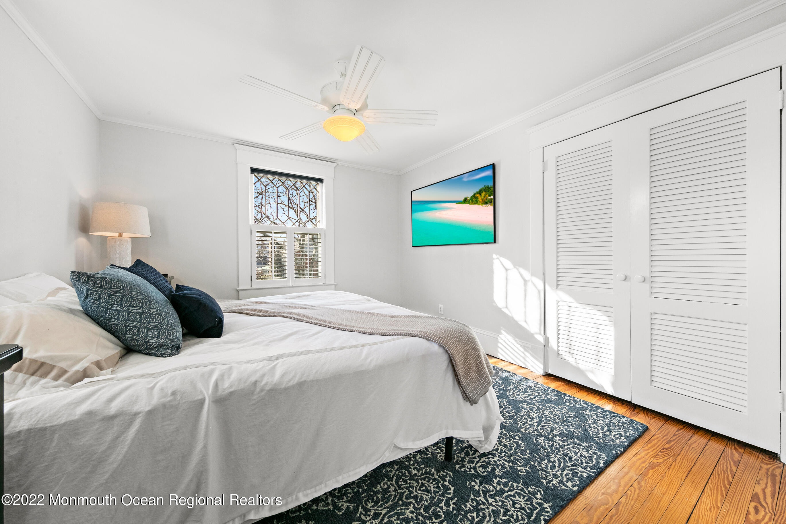 116 Tuttle Avenue Spring Lake, NJ 07762 - Photo 24 of 45 a bedroom with a bed and a window