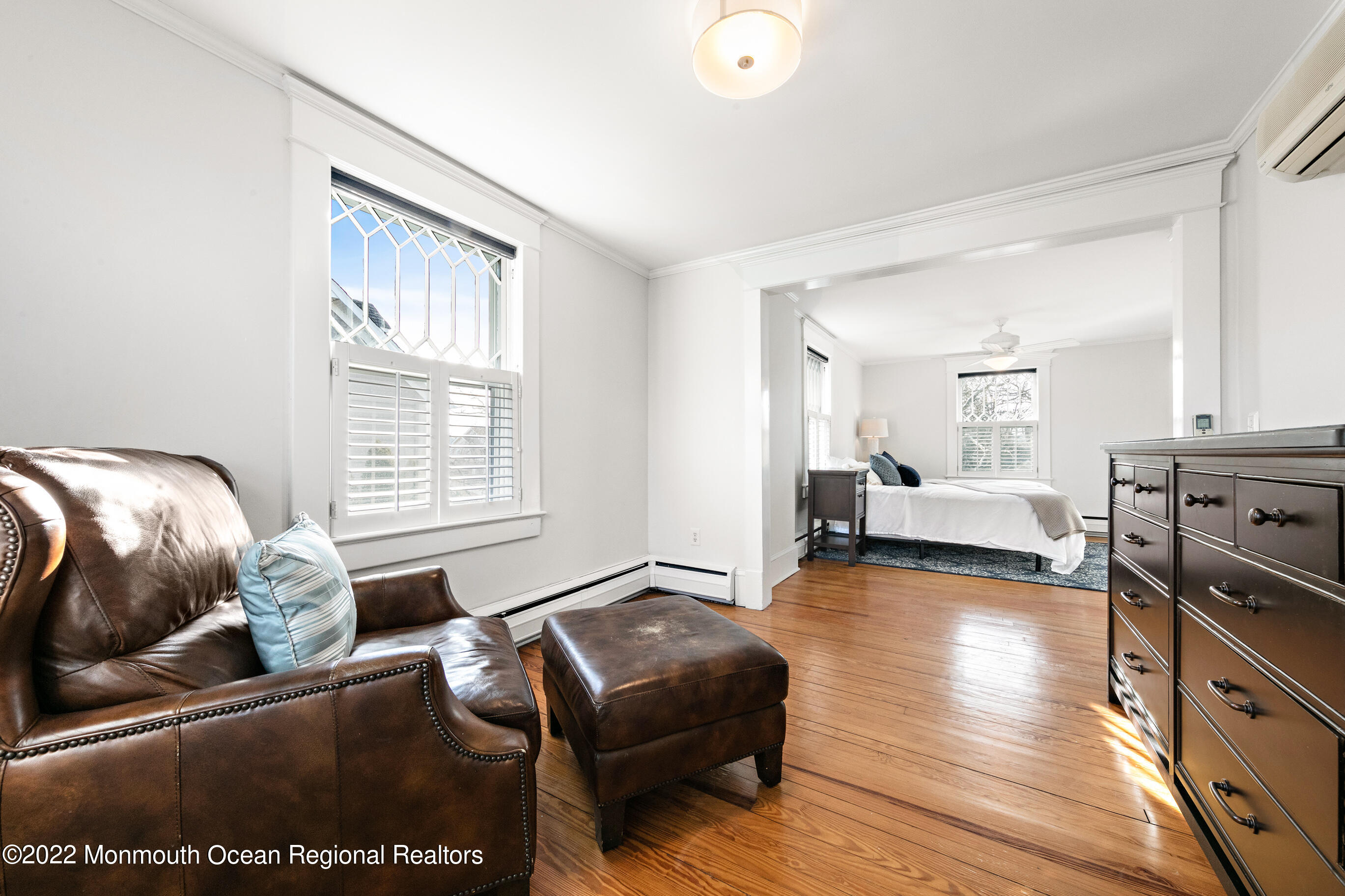 116 Tuttle Avenue Spring Lake, NJ 07762 - Photo 27 of 45 a living room with furniture and a table