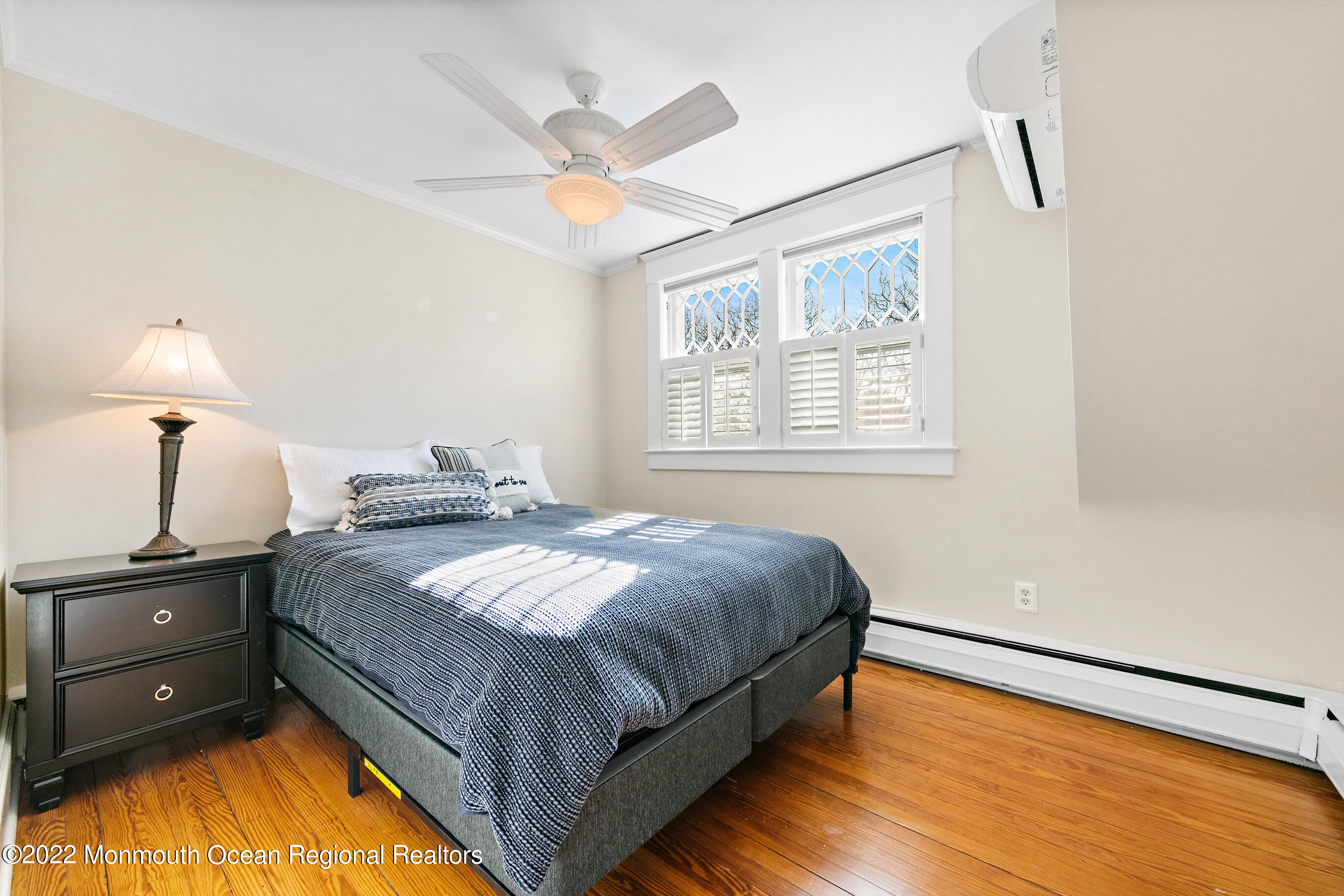 116 Tuttle Avenue Spring Lake, NJ 07762 - Photo 32 of 45 a bedroom with a bed and a window