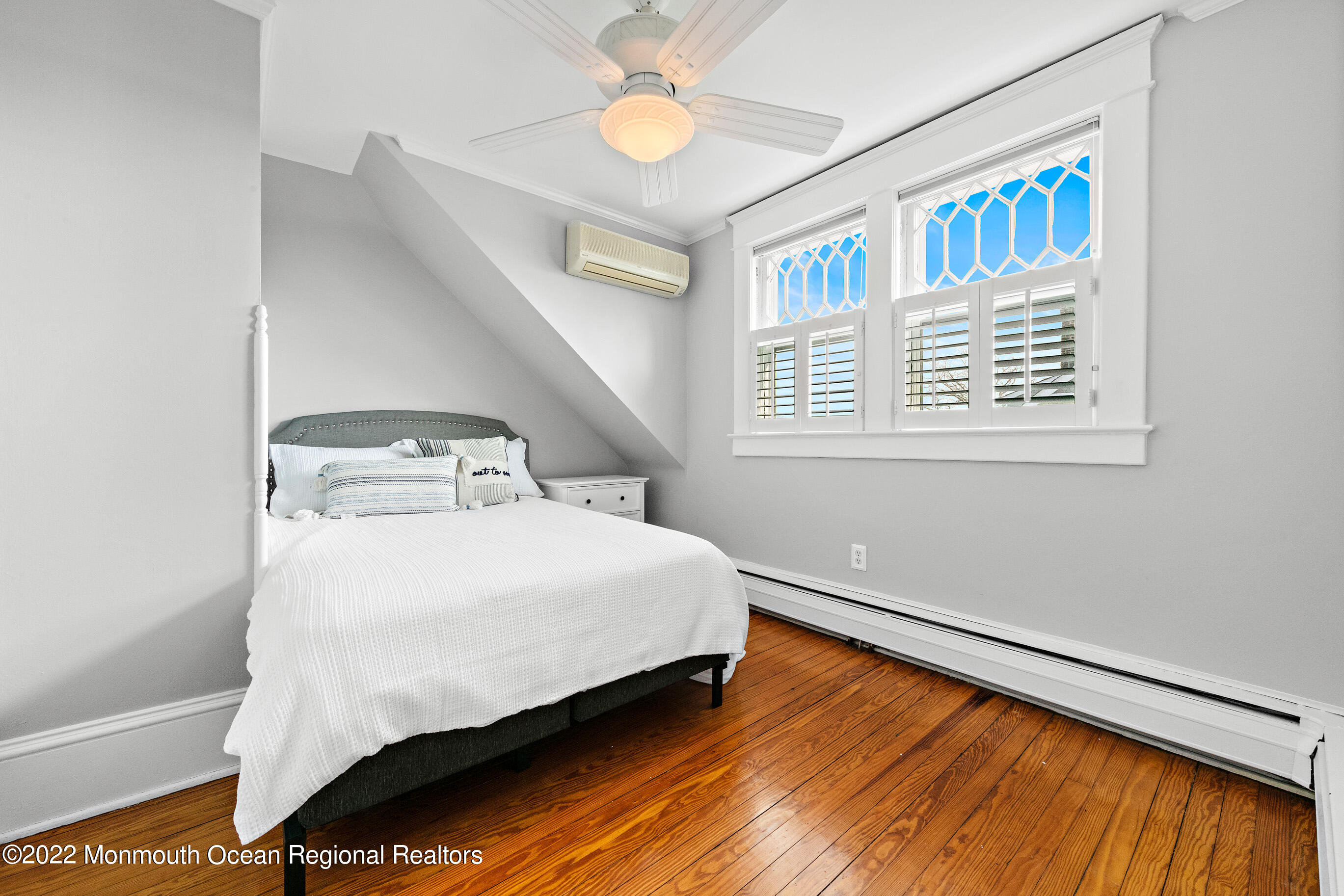 116 Tuttle Avenue Spring Lake, NJ 07762 - Photo 33 of 45 a bedroom with a bed and a window