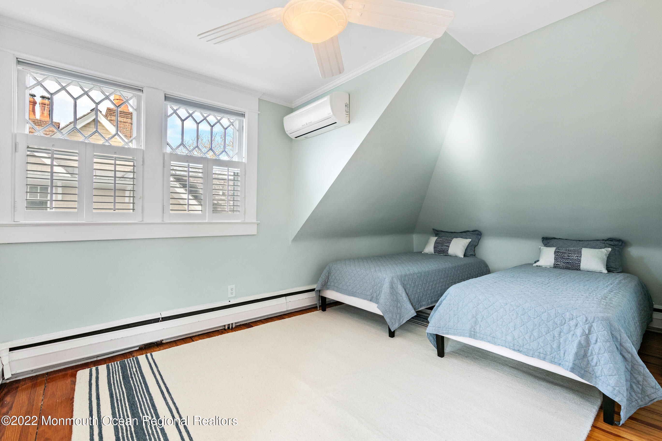 116 Tuttle Avenue Spring Lake, NJ 07762 - Photo 34 of 45 a bedroom with two beds and a window