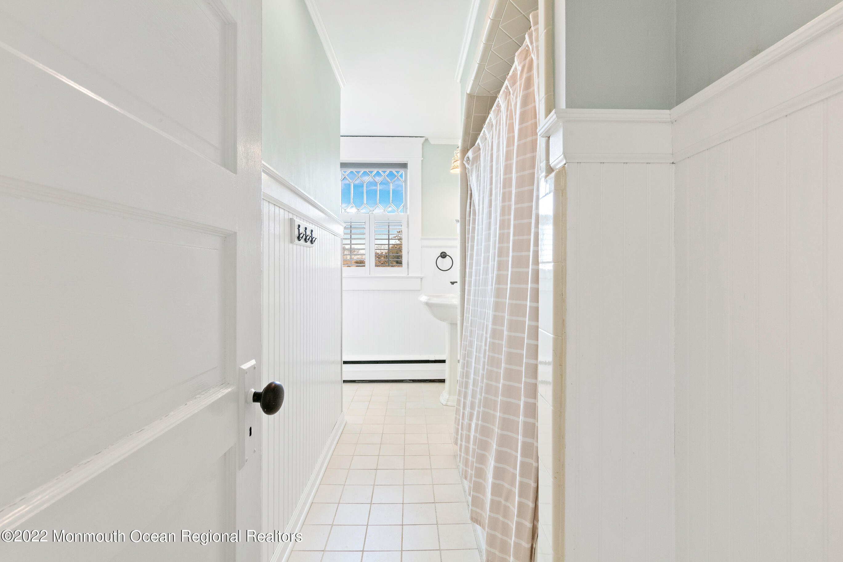 116 Tuttle Avenue Spring Lake, NJ 07762 - Photo 35 of 45 a bathroom with a shower