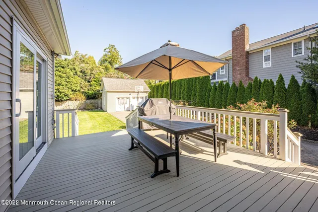 a view of a chairs on the roof deck