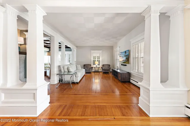 a living room with furniture and a table