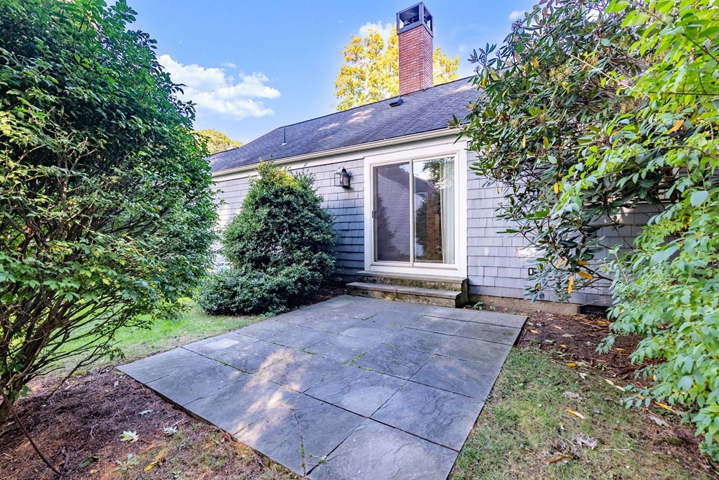 79 Jericho Road, Unit 79 Weston, MA 02493 - Photo 15 of 16 a view of a house with a yard