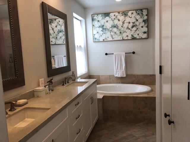 74130 Pele Place Palm Desert, CA 92211 - Photo 11 of 19 a bathroom with a sink and a mirror