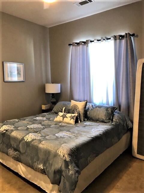 74130 Pele Place Palm Desert, CA 92211 - Photo 9 of 19 a bedroom with a bed and a window