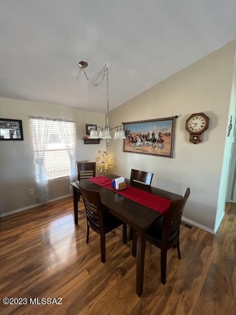 1343 Taylor Road Willcox, AZ 85643 - Photo 3 of 24 a view of a dining room with furniture window and wooden floor