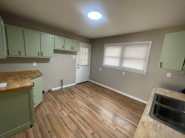 3602 Hallbrook Street Memphis, TN 38127 - Photo 10 of 12 Washroom with baseboards and light wood-style floors