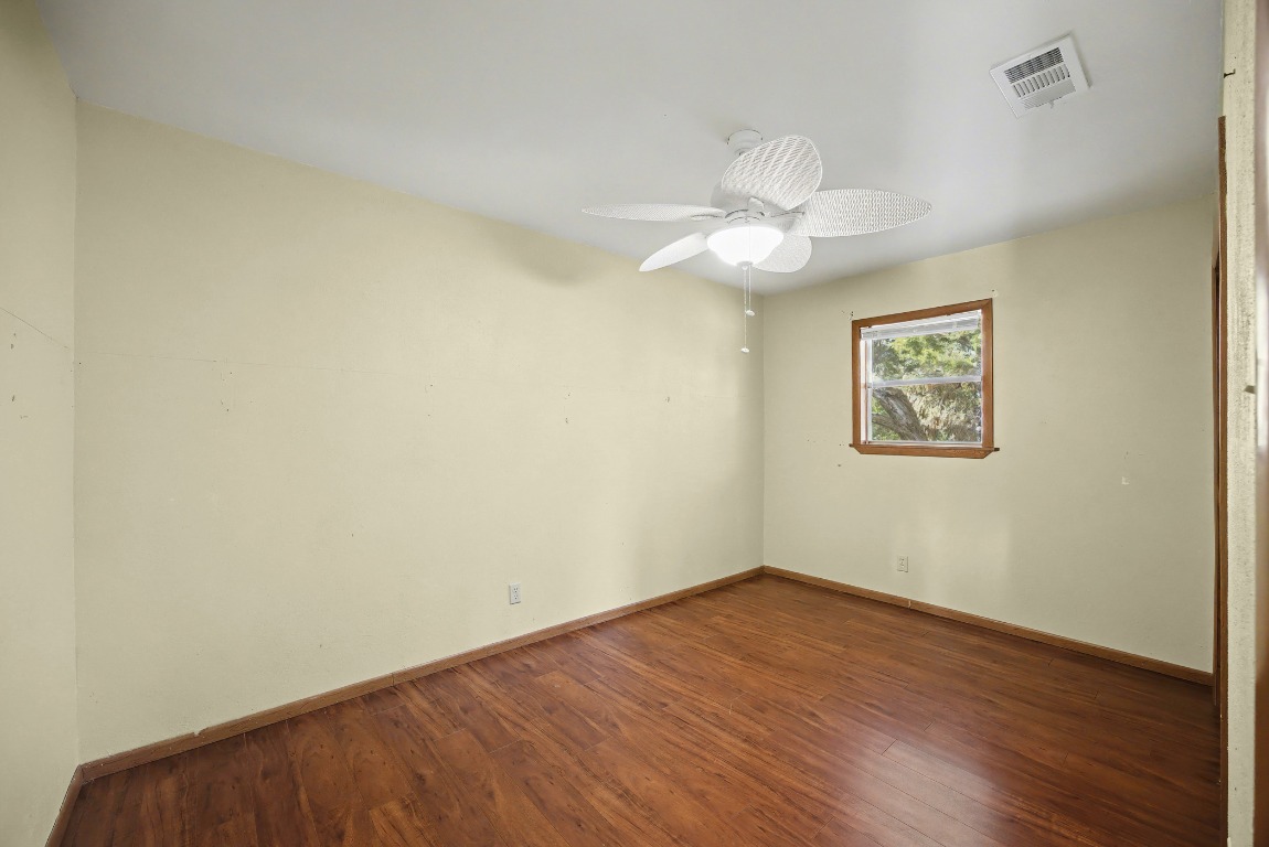17019 Rocky Ridge Road Austin, TX 78734 - Photo 14 of 37 wooden floor in an empty room