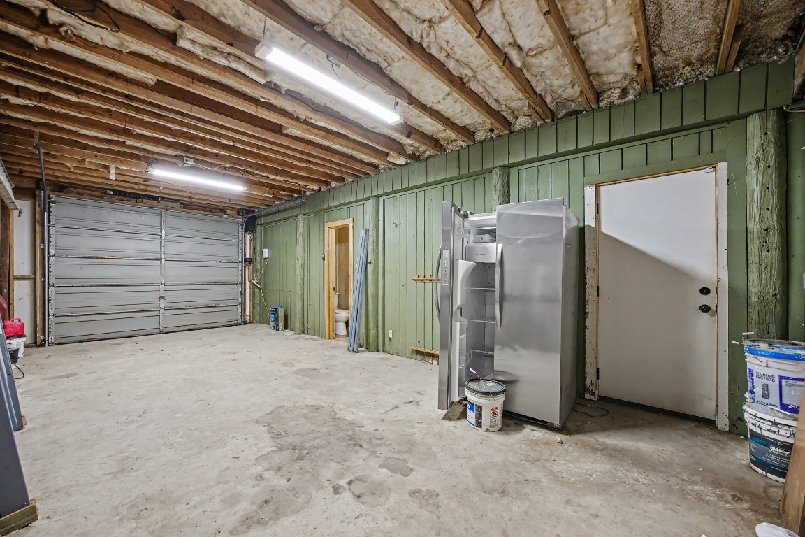 17019 Rocky Ridge Road Austin, TX 78734 - Photo 19 of 37 a view of a room with wooden walls