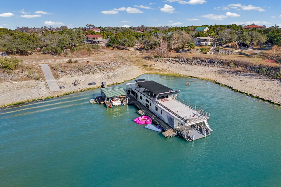 17019 Rocky Ridge Road Austin, TX 78734 - Photo 36 of 37 an aerial view of a house with a yard