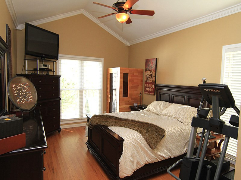 9908 Wyngate Ridge Drive Raleigh, NC 27617 - Photo 9 of 20 More hardwood floors located in this Master Suite with cathedral ceiling, updated fan and 2-inch blinds throughout. Downstairs Master