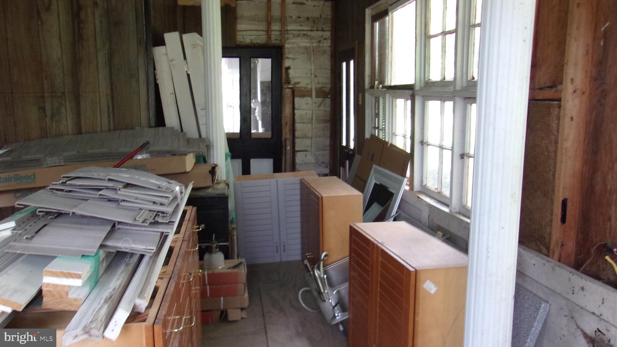 108 Knight Street Bloomington, MD 21523 - Photo 11 of 31 a view of living room with furniture and a window