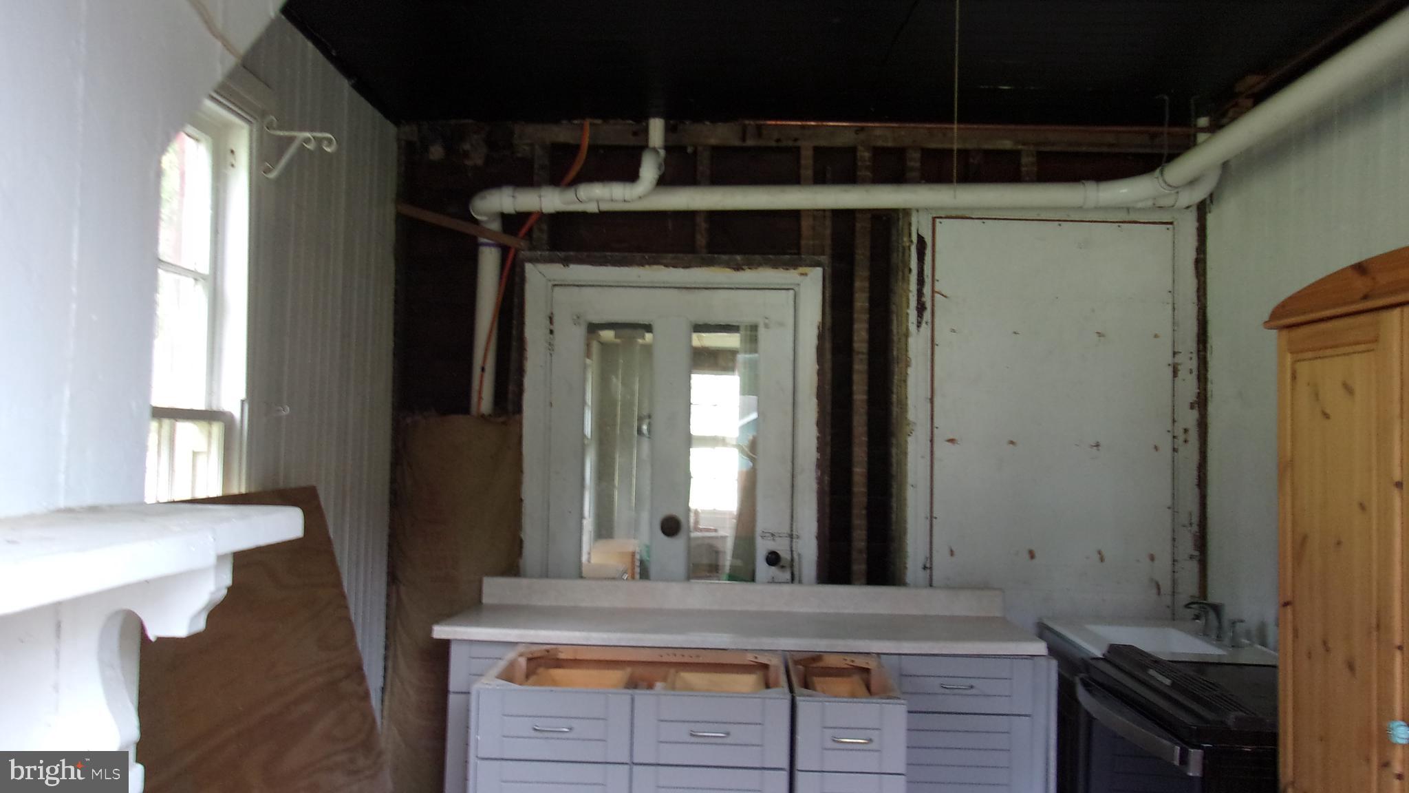 108 Knight Street Bloomington, MD 21523 - Photo 14 of 31 a view of living room and window