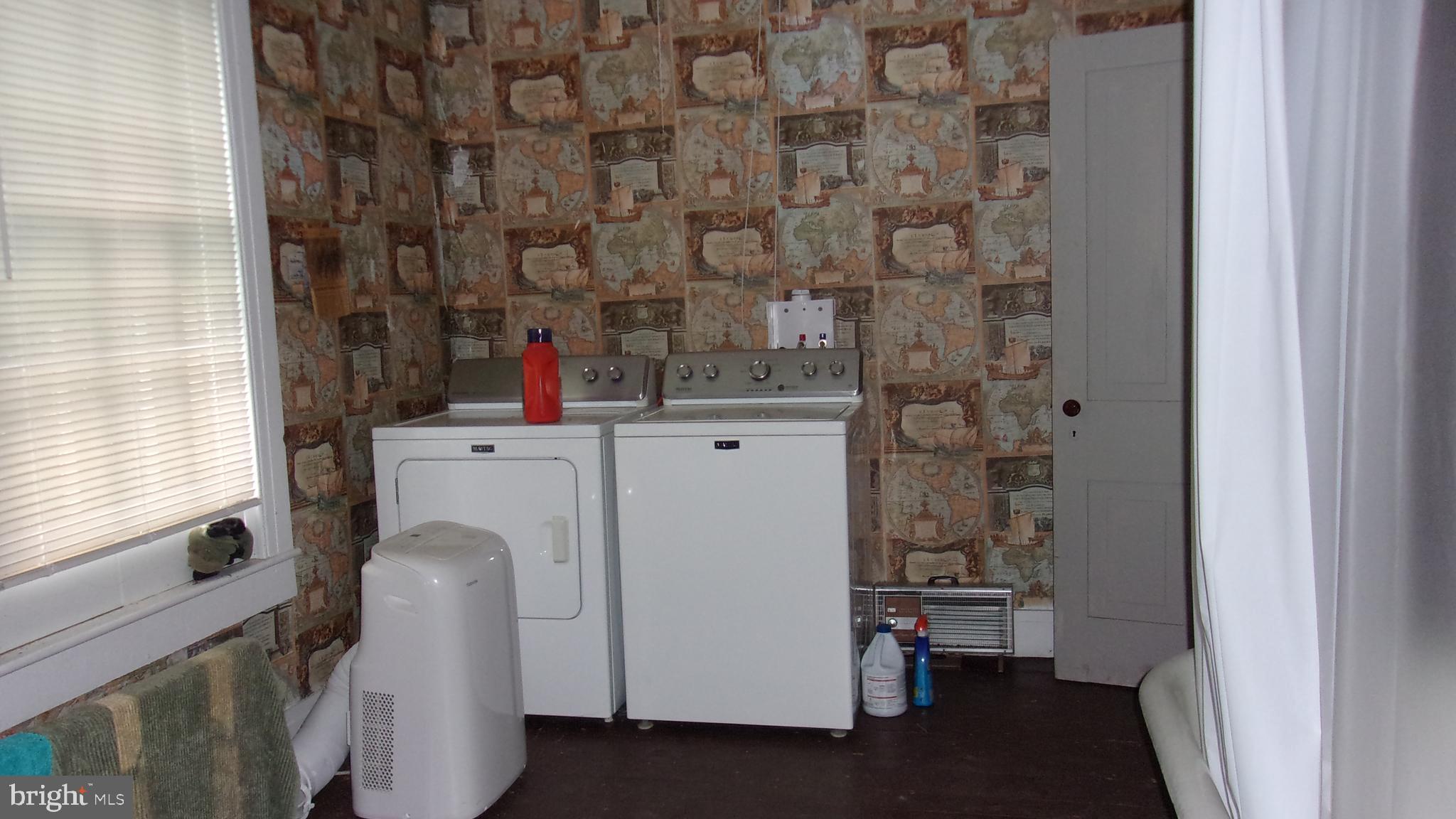 108 Knight Street Bloomington, MD 21523 - Photo 26 of 31 a utility room with dryer and washer