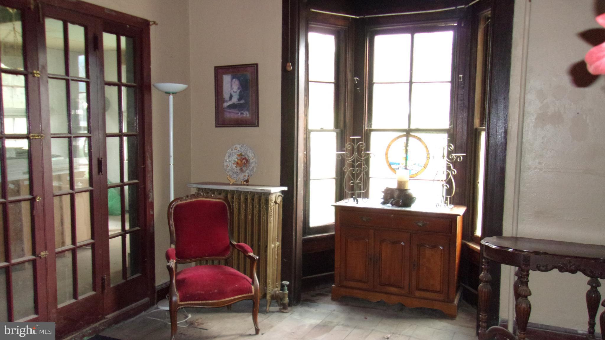 108 Knight Street Bloomington, MD 21523 - Photo 8 of 31 a room with furniture and windows