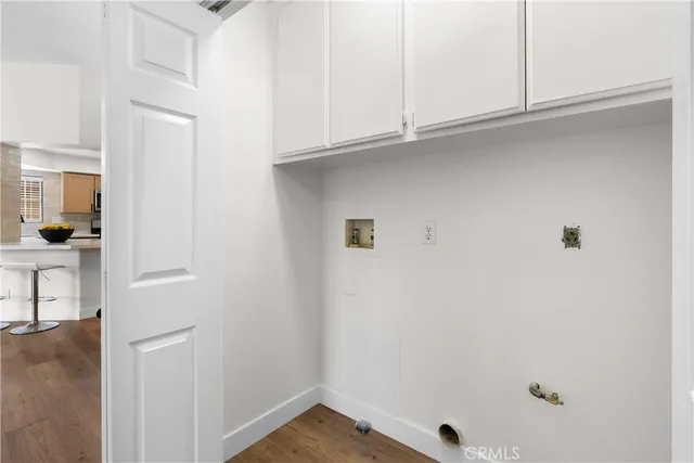 a view of small space with wooden floor