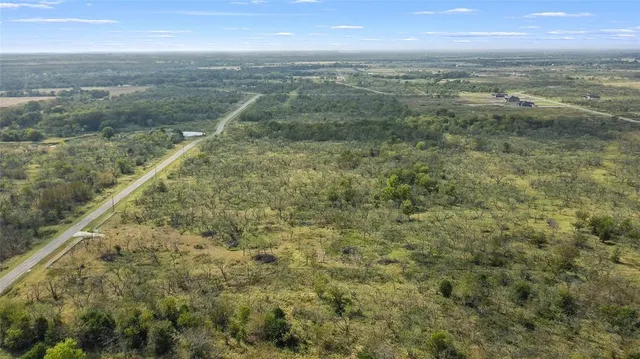 a view of a city with lots of trees