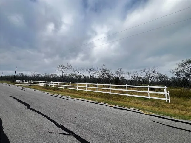 view of swimming pool with outdoor seating and yard in back