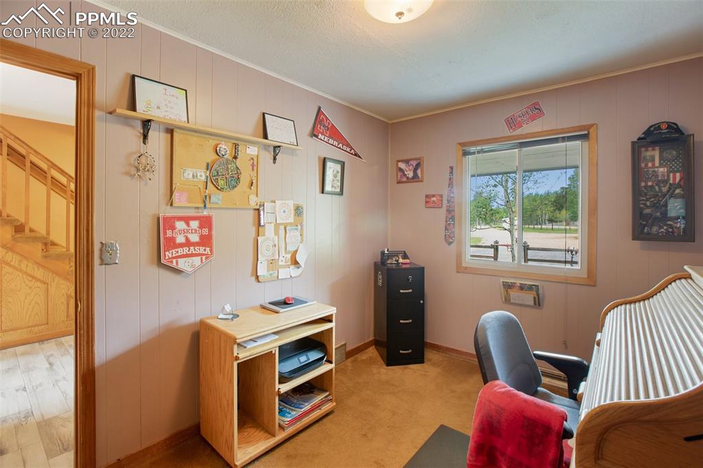12 Ridge Drive Divide, CO 80814 - Photo 19 of 49 a room with furniture and a window