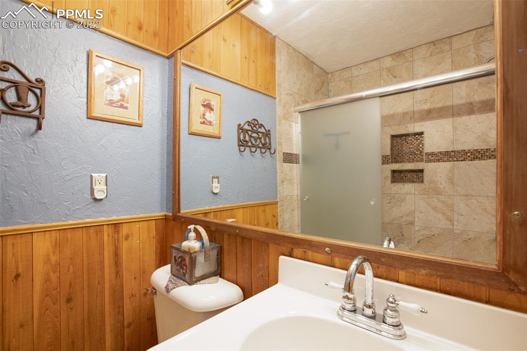 12 Ridge Drive Divide, CO 80814 - Photo 26 of 49 a bathroom with a sink and mirror