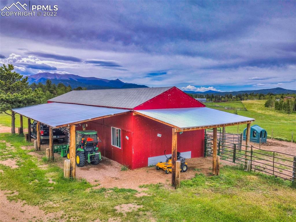 12 Ridge Drive Divide, CO 80814 - Photo 44 of 49 an outdoor space with furniture and umbrella