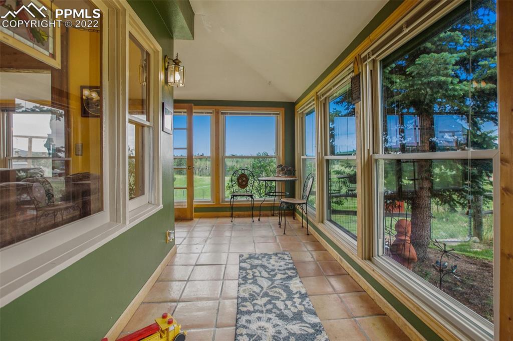 12 Ridge Drive Divide, CO 80814 - Photo 9 of 49 a view of a chairs and table in the balcony
