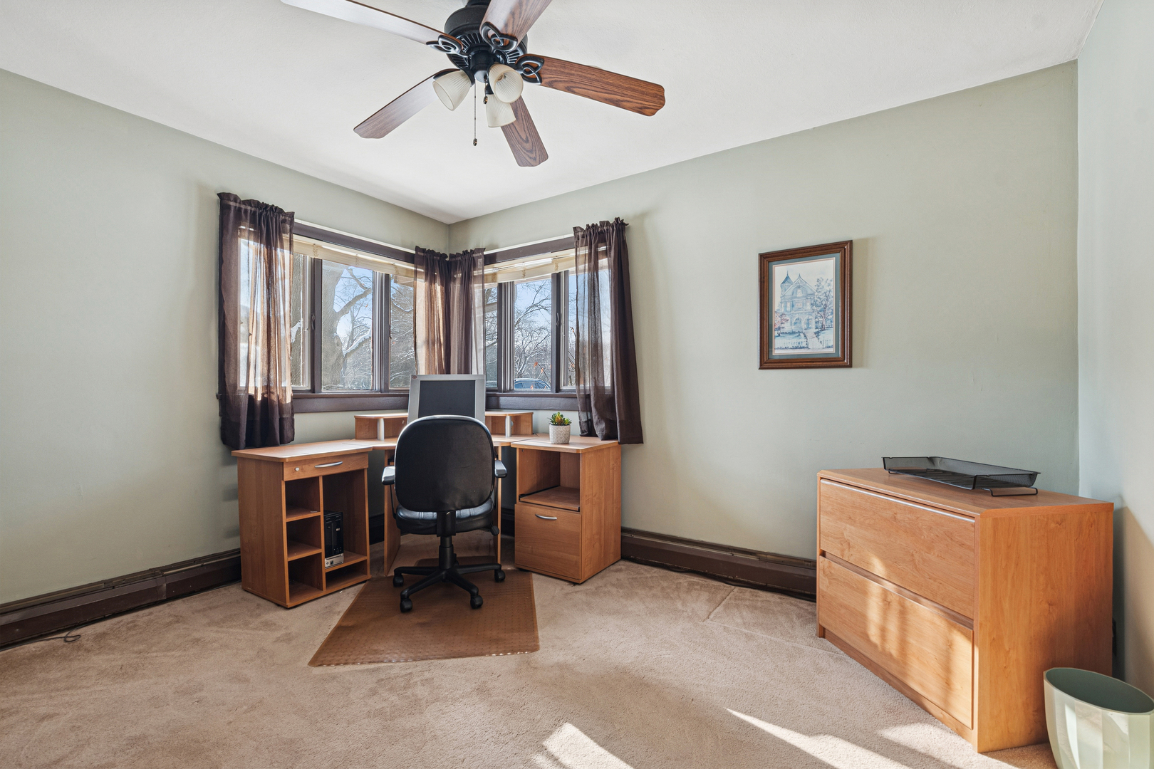 10705 Lane Street Crown Point, IN 46307 - Photo 16 of 36 a view of a workspace with furniture and a window