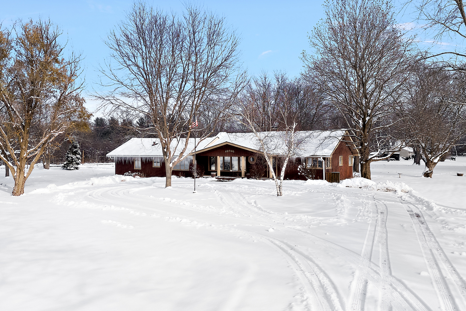10705 Lane Street Crown Point, IN 46307 - Photo 23 of 36 a view of a snow with a yard covered with snow