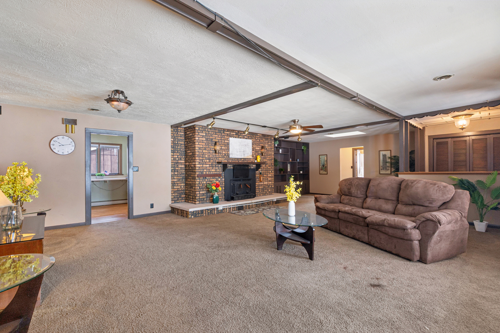10705 Lane Street Crown Point, IN 46307 - Photo 4 of 36 a living room with furniture and a large window