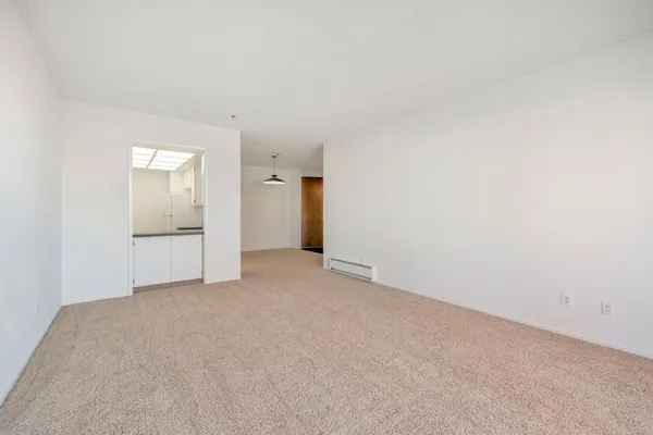 a view of an empty room and window