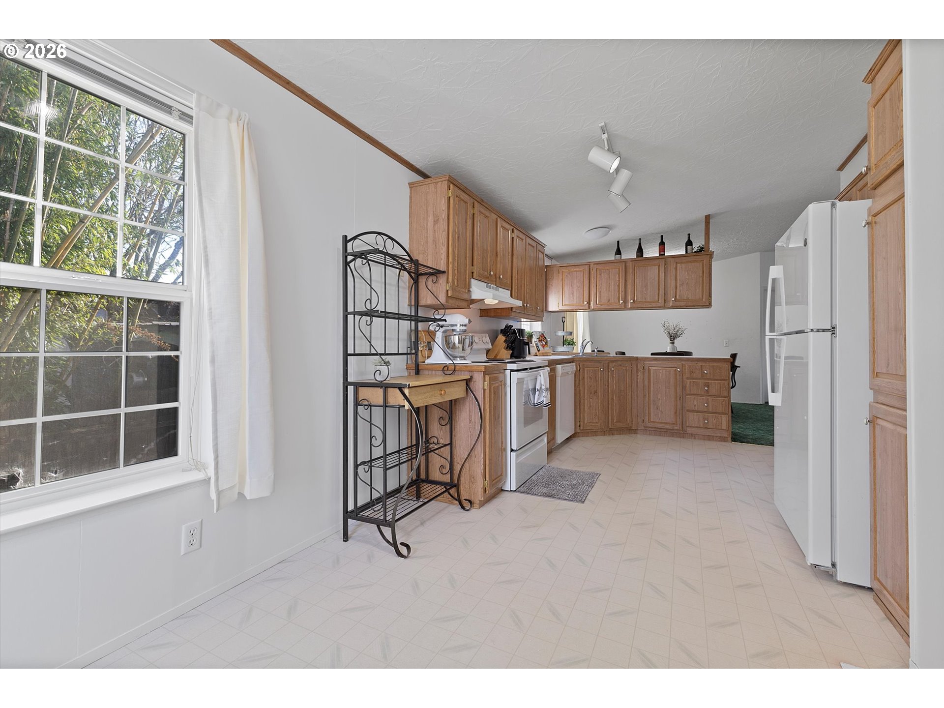 32935 Southwest Oakview Court Cornelius, OR 97113 - Photo 19 of 47 a view of kitchen with furniture and windows