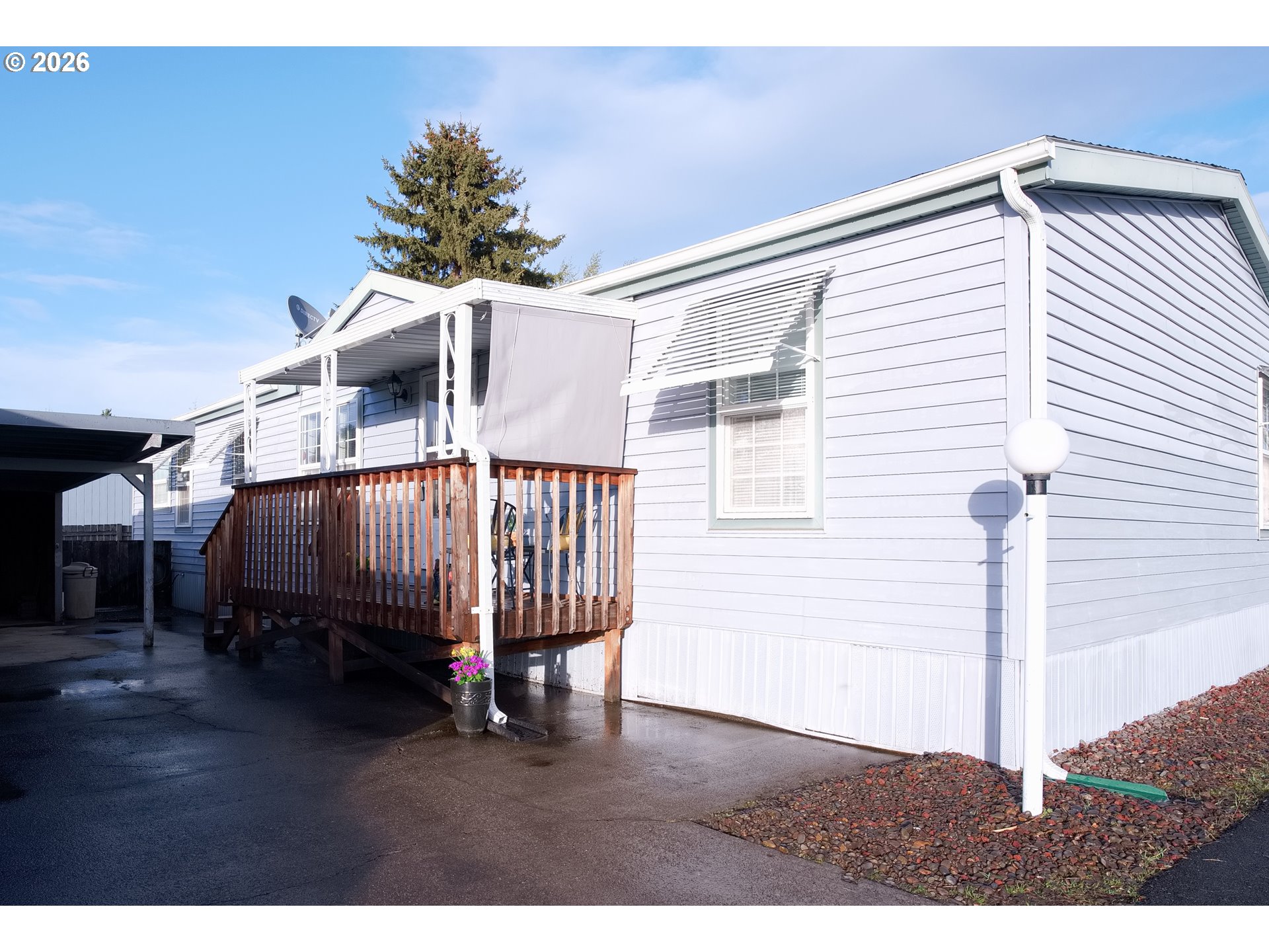 32935 Southwest Oakview Court Cornelius, OR 97113 - Photo 2 of 47 a blue bed sitting in a room next to a window