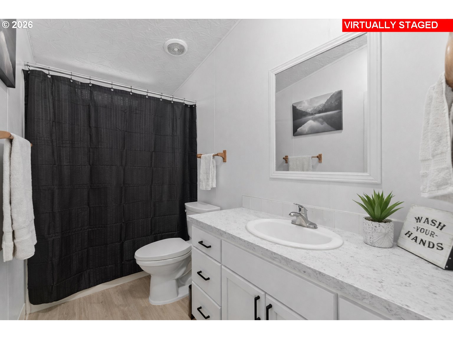 32935 Southwest Oakview Court Cornelius, OR 97113 - Photo 36 of 47 a bathroom with a sink vanity mirror and toilet