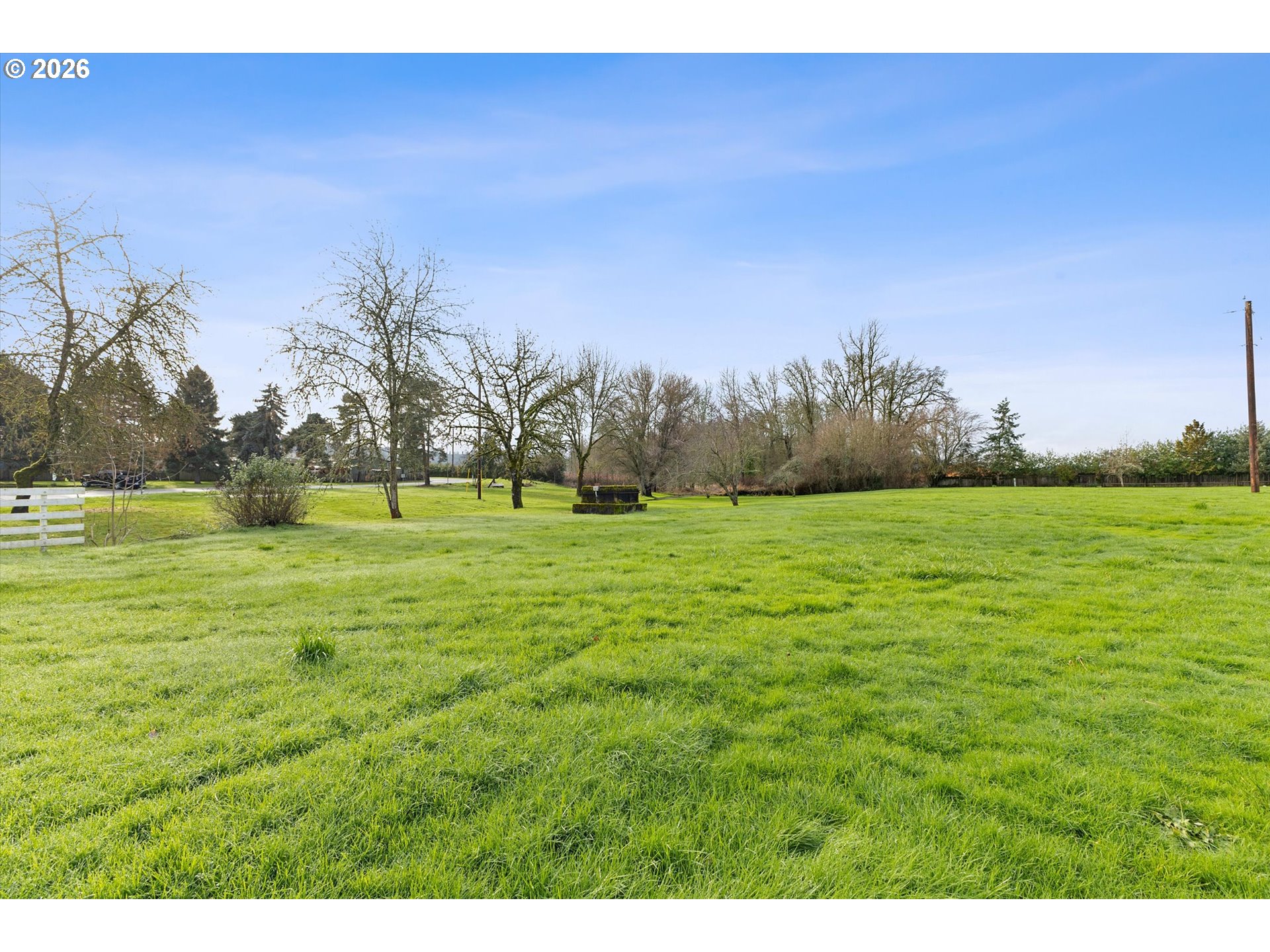 32935 Southwest Oakview Court Cornelius, OR 97113 - Photo 45 of 47 a grassy field with trees in the background