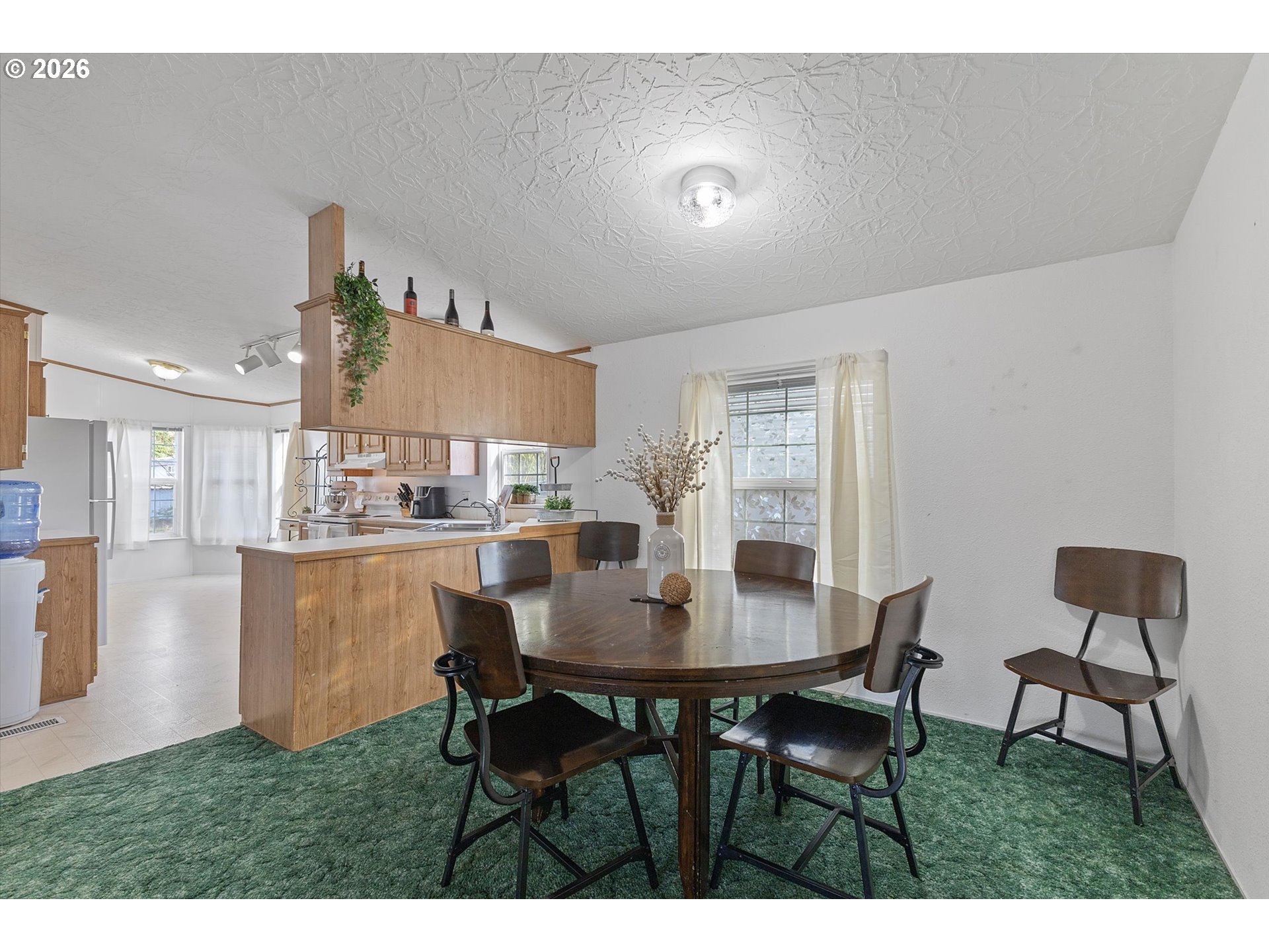 32935 Southwest Oakview Court Cornelius, OR 97113 - Photo 10 of 47 a dining room with furniture and wooden floor