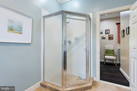 a dining room with a window and a sink