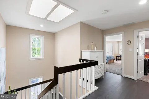 a room with furniture and wooden floor