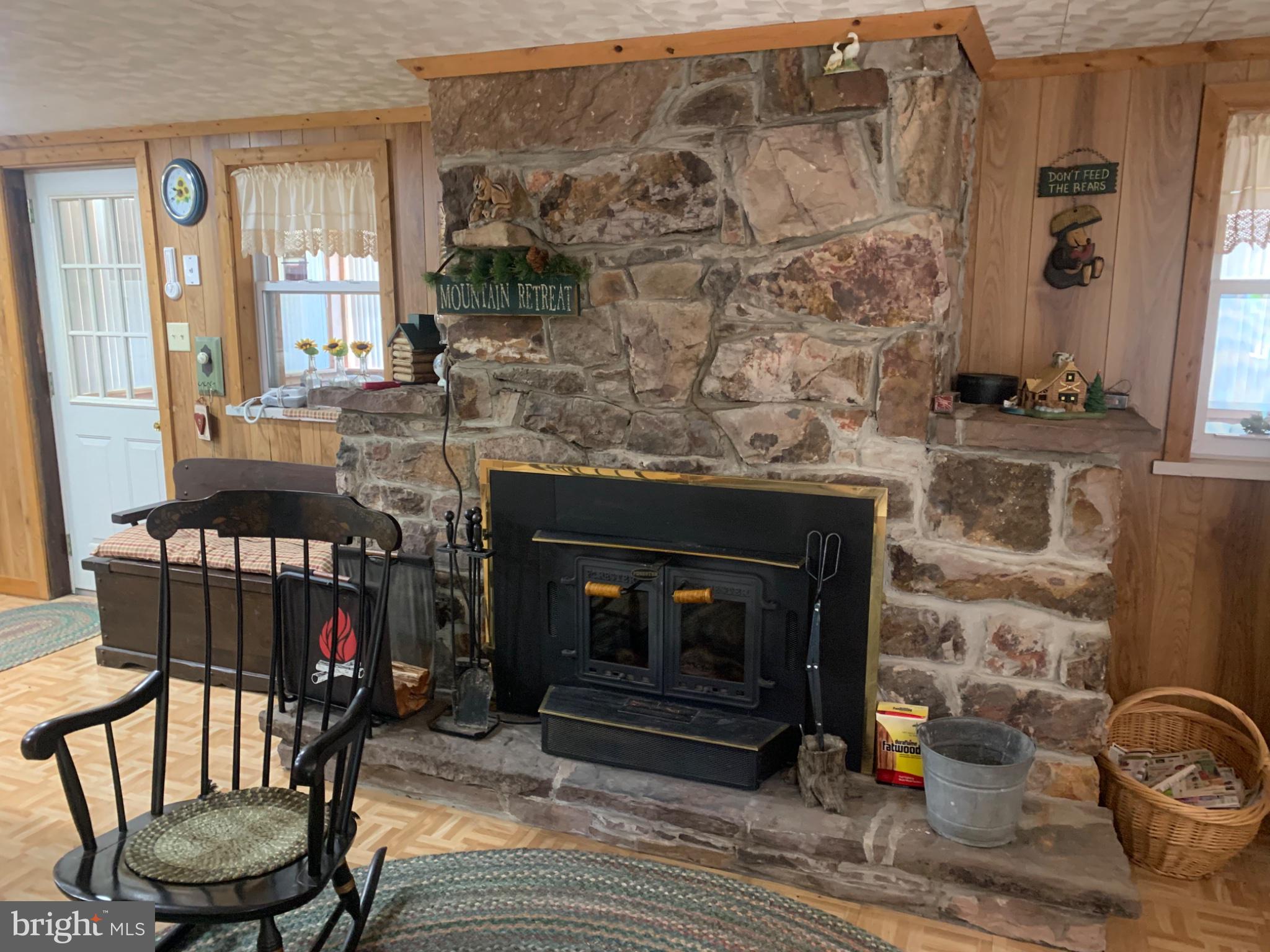 5547 Fox Road Fort Loudon, PA 17224 - Photo 18 of 27 Cozy stone fireplace for warm winter nights.