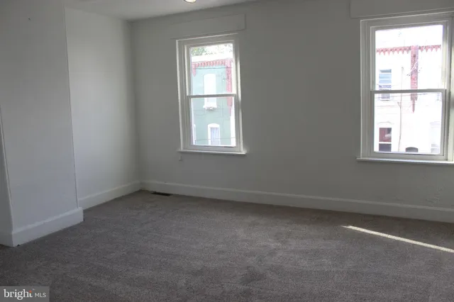 an empty room with a window