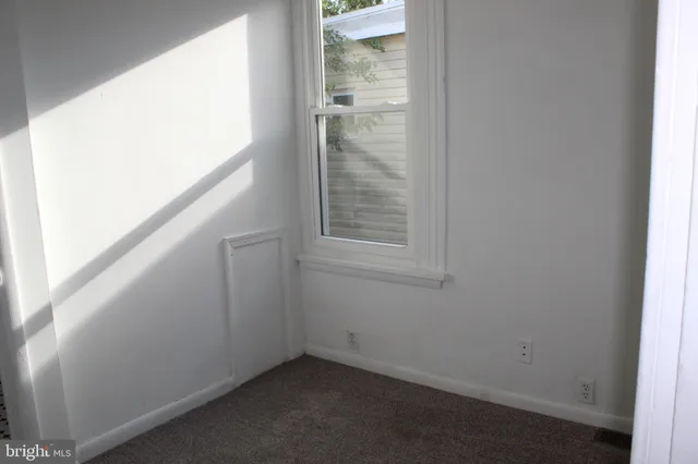 a view of hallway with closet