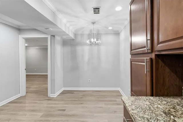 a kitchen with a stove and a microwave