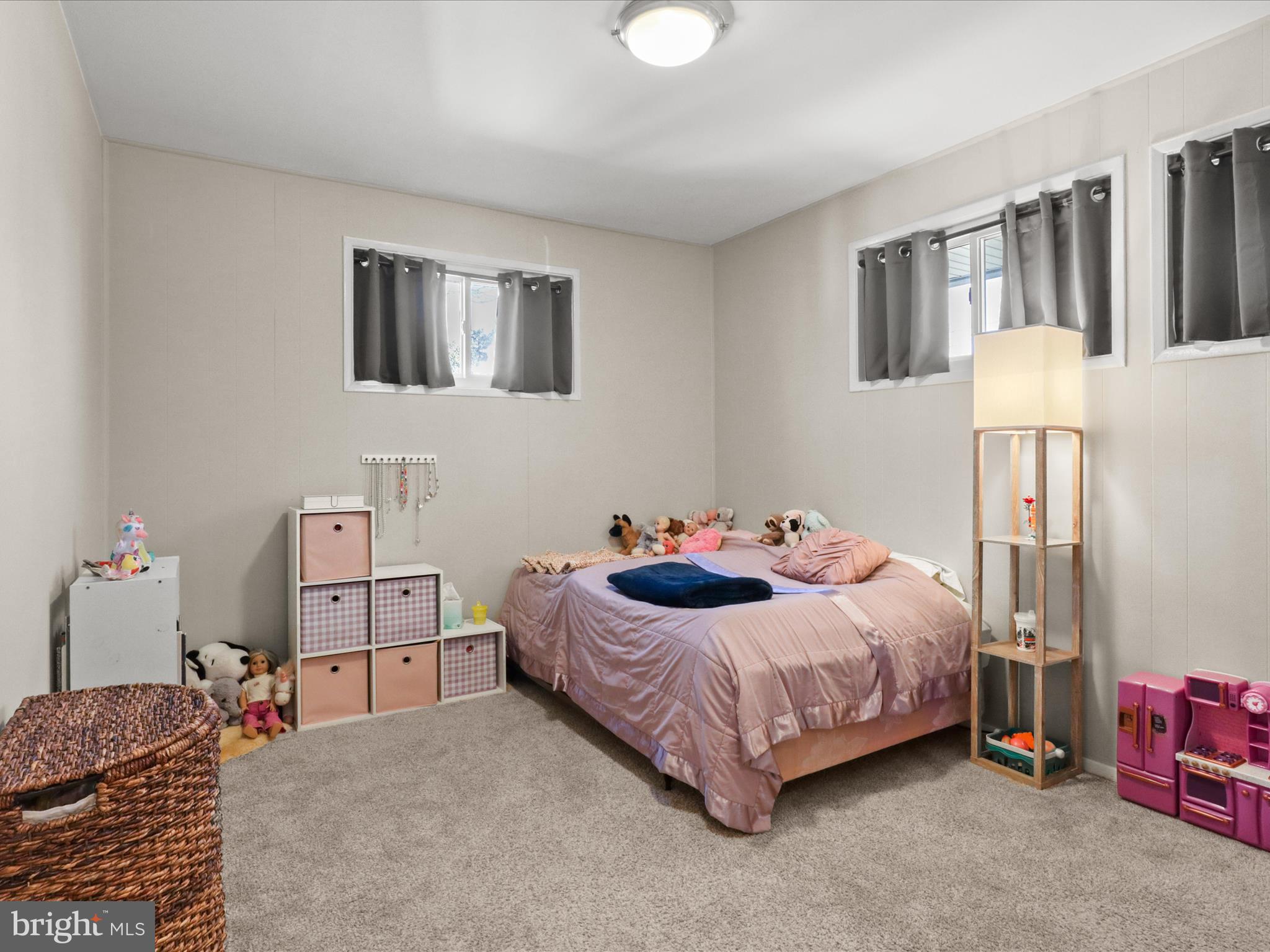 5908 Hanover Avenue Springfield, VA 22150 - Photo 22 of 32 a bedroom with a bed and a night stand