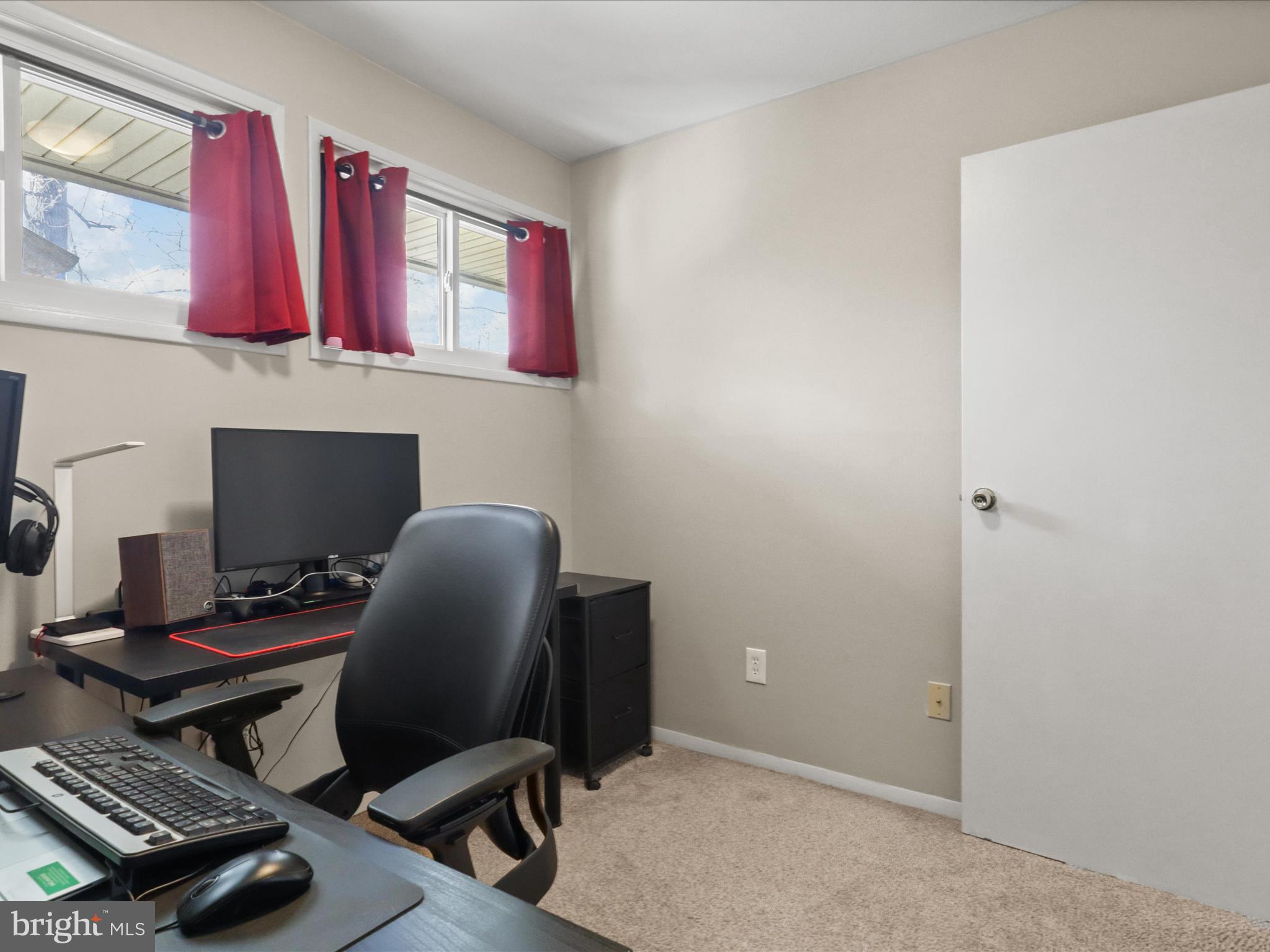 5908 Hanover Avenue Springfield, VA 22150 - Photo 25 of 32 a view of a workspace with furniture and a window