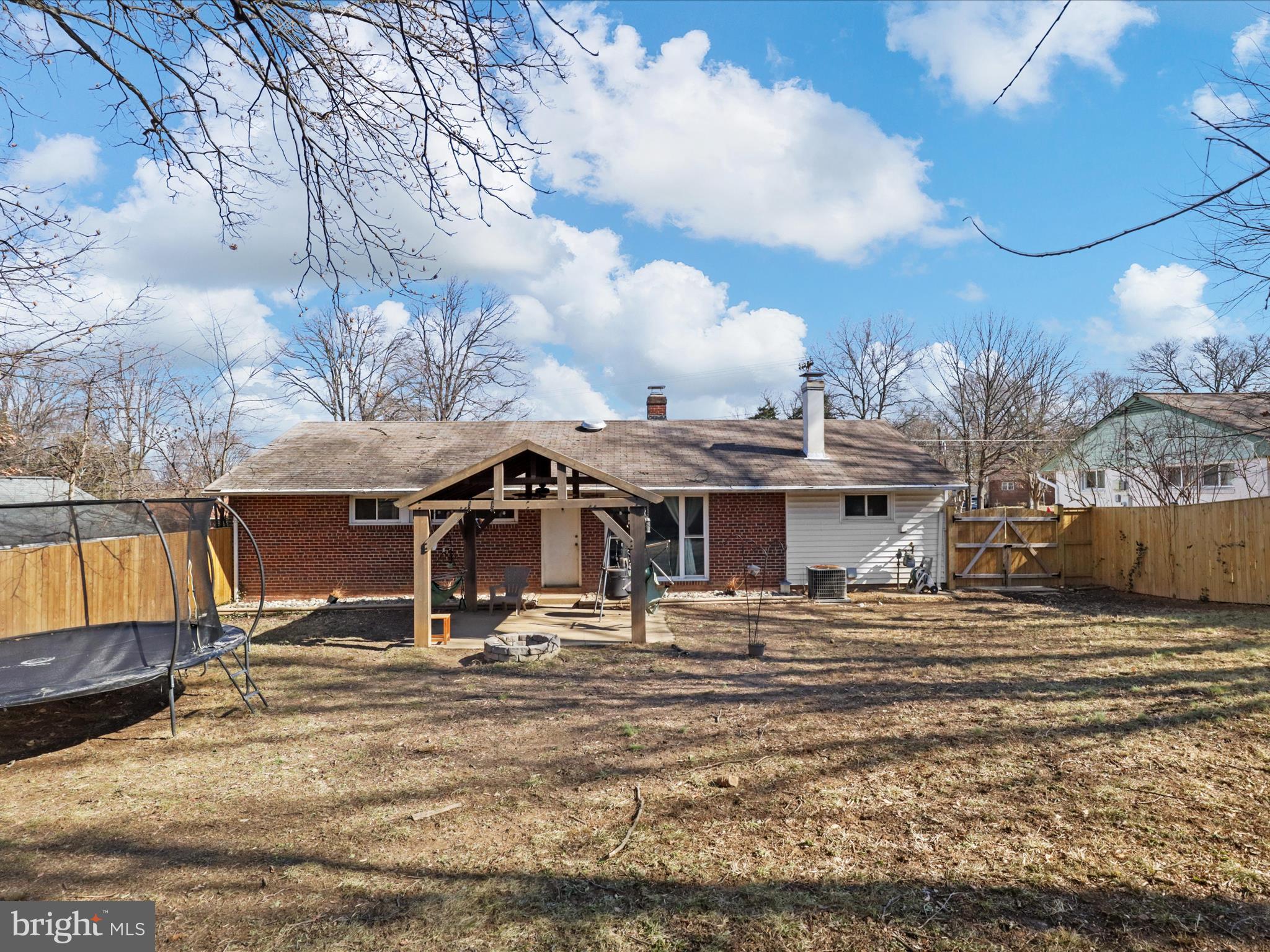 5908 Hanover Avenue Springfield, VA 22150 - Photo 27 of 32 a front view of a house with a yard